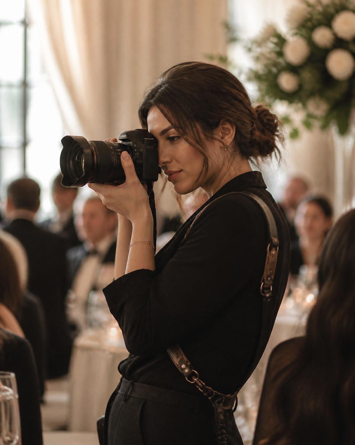 A Mubarak Studio photographer capturing an elegant event